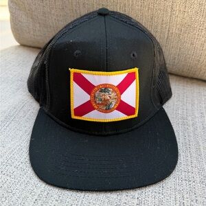 Flo Grown Black Mesh Trucker Hat with Florida Flag Patch